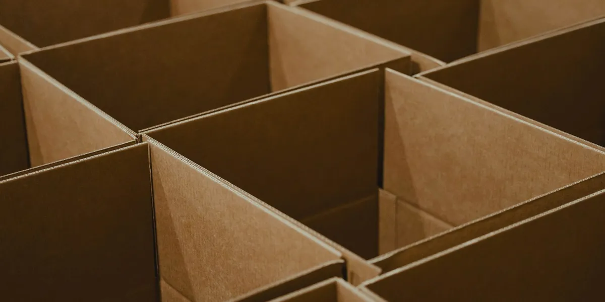 a lot of brown boxes that are open