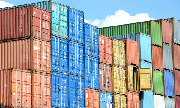 blue red and yellow intermodal containers