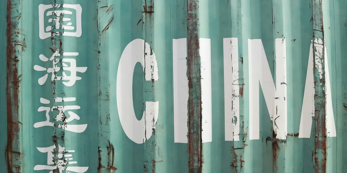 A close up of a metal container with writing on it